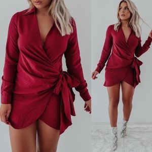 . Shop Hope’s Burgundy Wrap Tie Dress